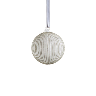 a silver and gold glittery ornament from a ribbon