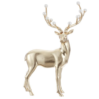 a gold reindeer with pearls on it