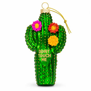 a green cactus with flowers on it