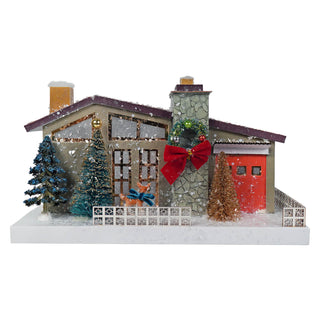 a house with trees and a bow