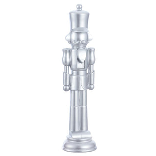 a silver nutcracker statue