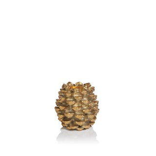 a gold pine cone candle holder