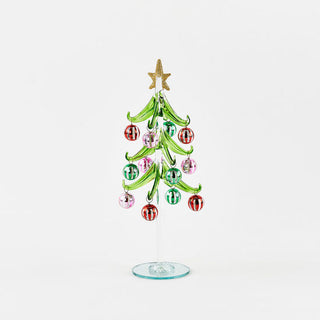 a small glass christmas tree