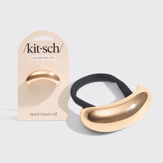 a gold hair band in a packaging