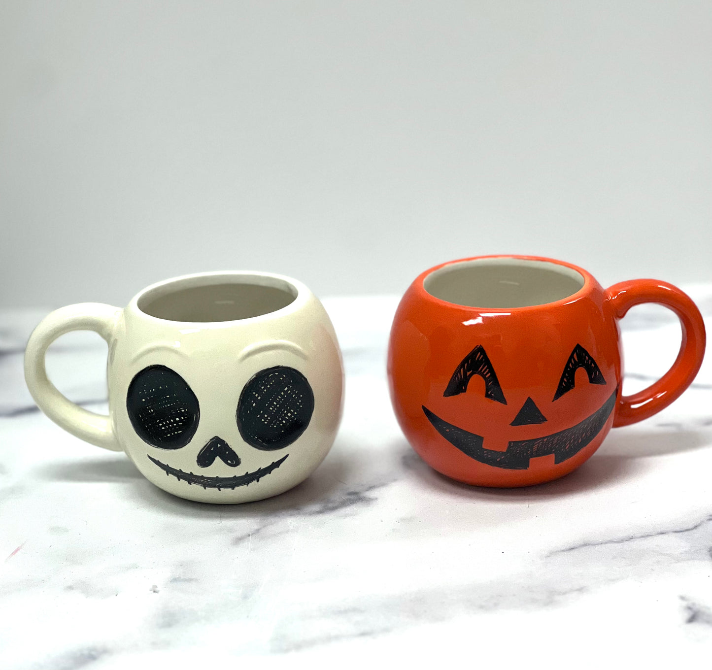 Pumpkin and Skeleton Mugs