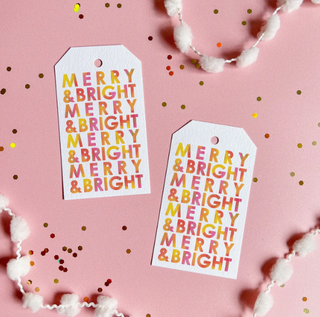 a pair of tags with text on it