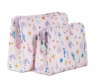 a pair of pink bags with sea creatures on them