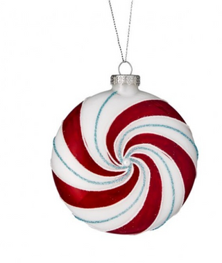 a red and white swirly ornament