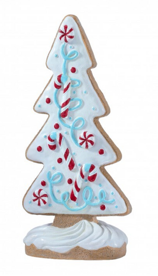 a gingerbread cookie with candy canes and candy canes