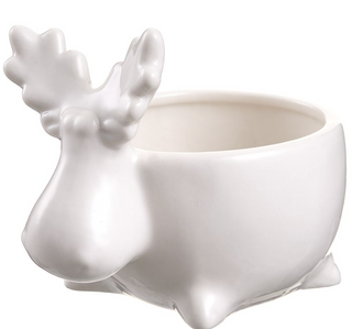 a white ceramic cup with a moose head