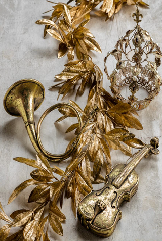 a gold crown and a violin