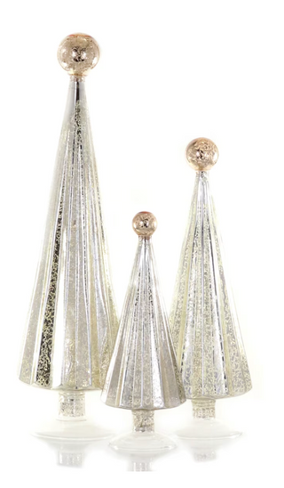 a group of silver and gold christmas trees