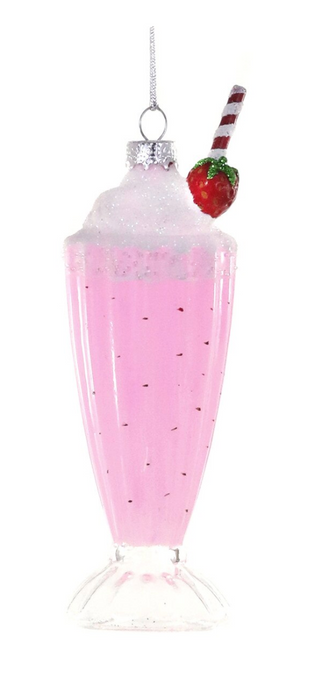 a pink drink with a strawberry on top