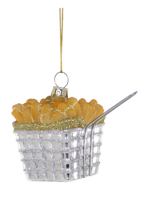 a christmas ornament with a basket of food