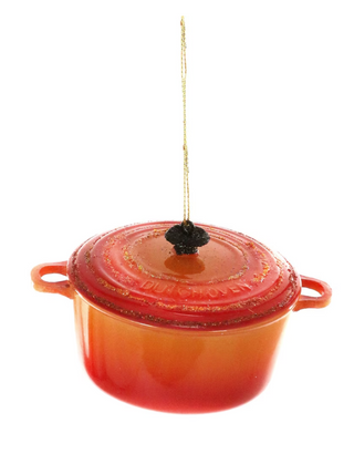 a red and orange pot with a black lid