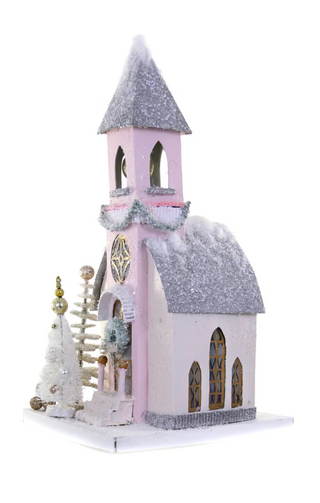 a small pink and white church