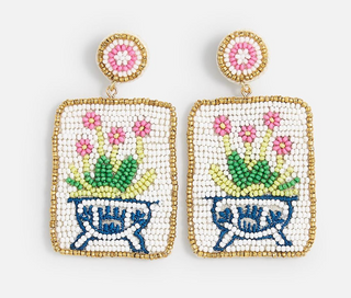 a pair of beaded earrings