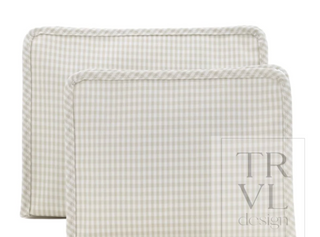 a pair of white and grey checkered pillows