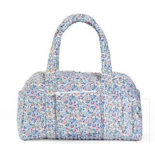 a blue and white floral bag