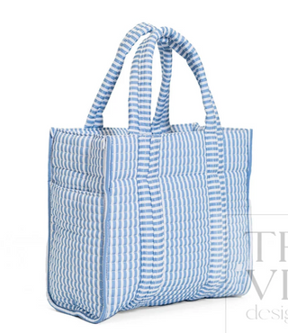a blue and white striped bag