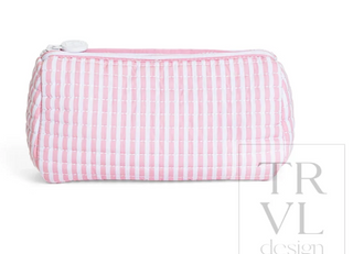 a pink and white striped bag