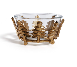 a glass bowl with gold leaves